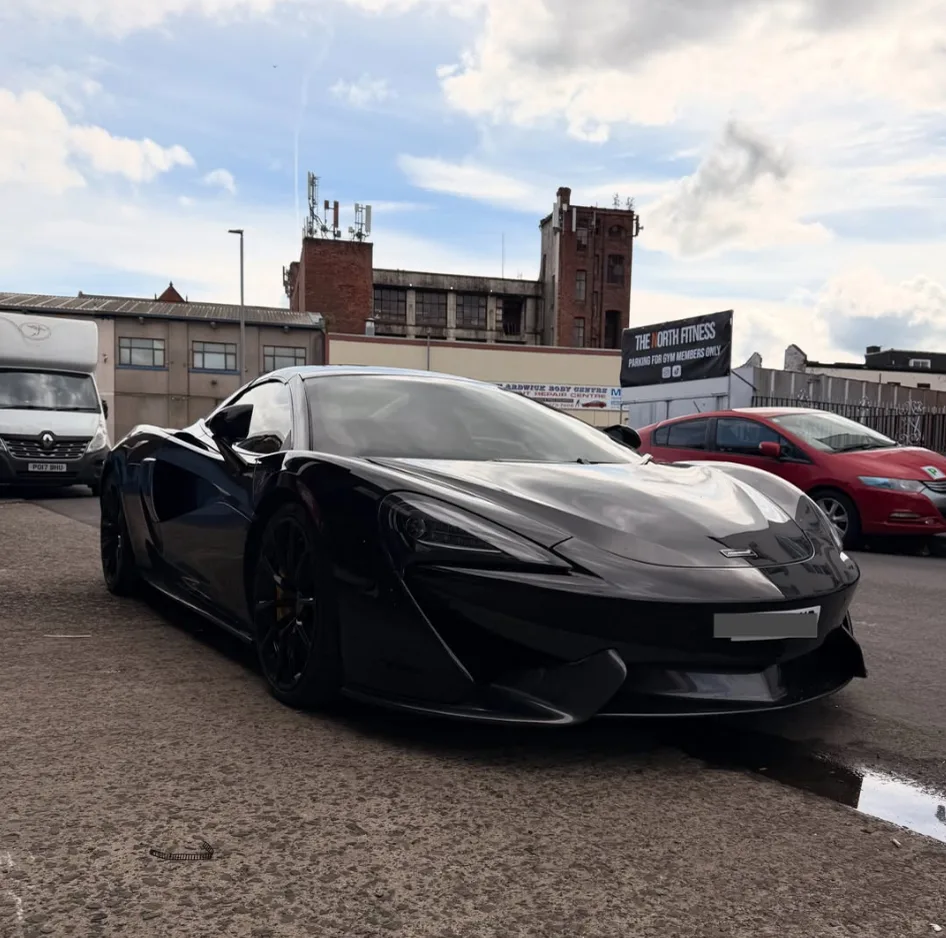 Black McLaren outside Safi Autos