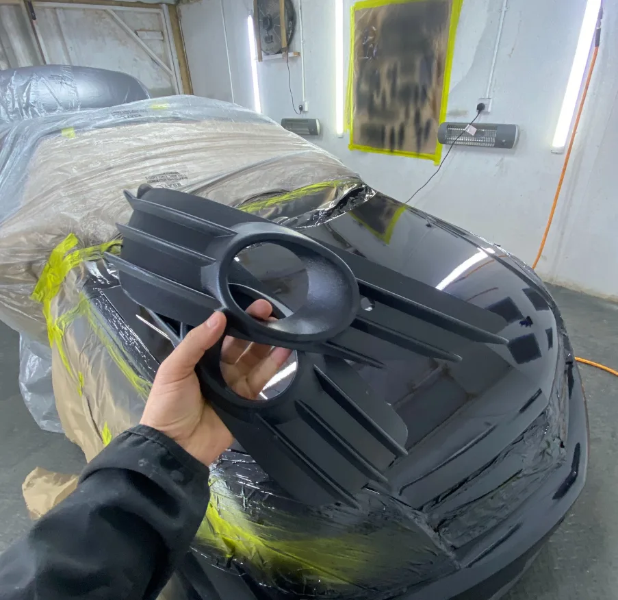 Car in the paint booth at Safi Autos